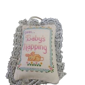 Vintage baby sleeping crosstitch door hanger